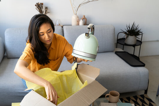 Woman buys home appliance