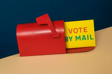 vote by mail letter in a red mailbox