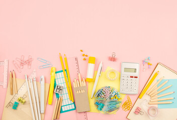 stationery items for girls or women on light pink background. Back to school. Female Student's,...