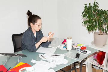 Focused Employee Checking Financial Documents