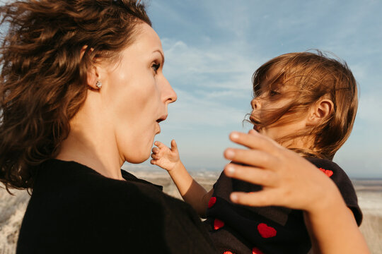 Mother and Child in Evening Wind