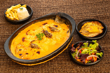 Baked trout with shrimp and crabs - Rainbow trout from Lake Tota Boyaca. Colombian gastronomy