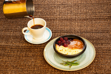 Typical Colombian dessert - Blackberry, fried cheese and caramel sauce - Hot coffee drink