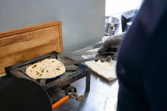 Indian Restaurant Worker Cooking Indian Bread Chapati