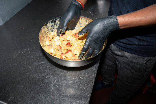 Kitchen Worker Mixing Matar Paneer Mutter Masala