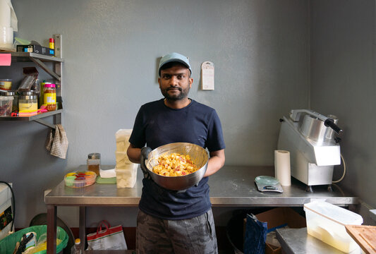 Indian Man Holding Matar Paneer Mutter Masala Mix