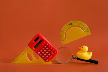 The set with a  hanging calculator and rulers