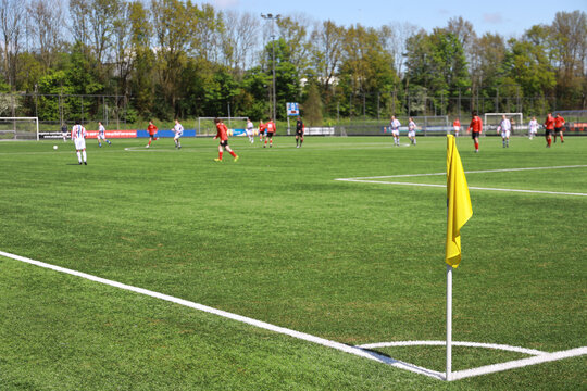 yellow flag at corner of soccer field