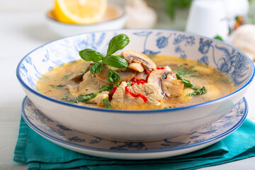 Spicy chicken soup with mushrooms.