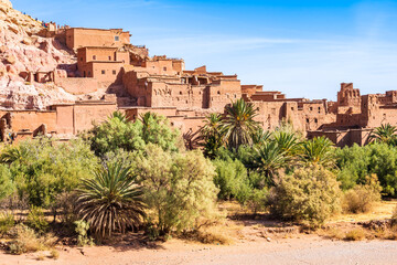 Palm trees in oasis of Ksar Ait Ben Haddou, old Berber ancient village or kasbah, Ouarzazate,...