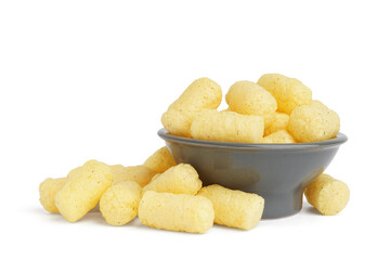 Bowl with tasty corn sticks on white background