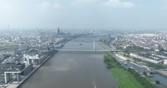 City view over Cologne, north hine westphalia, Germany at the Rheinauhafen, we see the rhine river and bridges infrastructure, city skyline, severingsbrucke, deutzer brucke and the sudbrucke and the