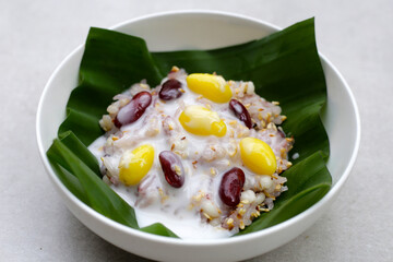 Sweet black sticky rice with grains. Thai dessert