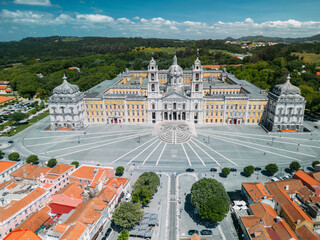 Aerial drone view of Convent of Mafra and lovely village houses, Portugal - UNESCO World Heritage...