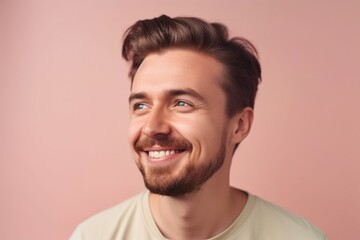 Fototapeta premium A man with a beard and a smile on his face