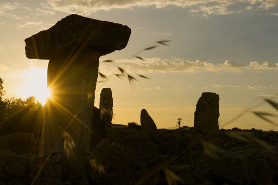 Sunset in the megalithic structure in the talayotic town of Trepuc&oacute; on the island of Menorca, Spain.