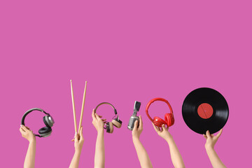Women with headphones, drumsticks, microphone and vinyl disk on purple background