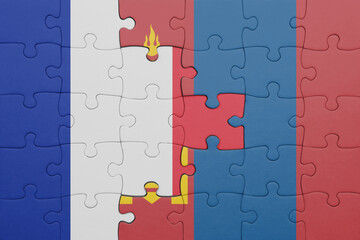 puzzle with the colourful national flag of mongolia and flag of france.