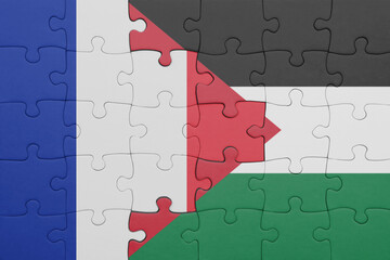 puzzle with the colourful national flag of palestine and flag of france.