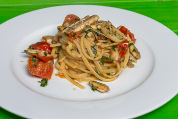 Linguine with cherry tomatoes and fresh anchovies.