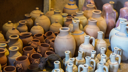 Colorful assortment of handcrafted Cappadocian pottery. Various sizes and shapes of jugs, pitchers,...
