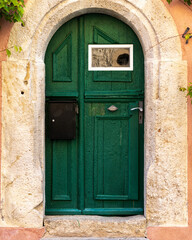 Amazing old wooden door with beautiful carpentry job in Rothenburg ob der Tauber, Bavaria, Germany