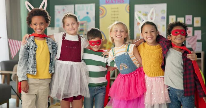 Happy children, friends and hug with costume in class for dress up or casual day at school together. Portrait of young kids with smile for halloween in cosplay outfit, hero or fairy tale in room