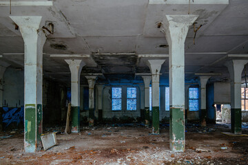 Large abandoned industrial hall interior