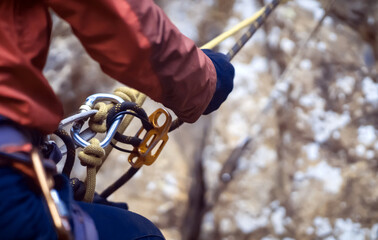 Girl with mountaineering equipment outdoor.