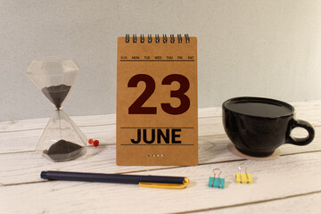 June 23. Blue cube calendar with month date isolated on white background.