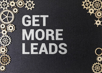 Get More Leads text as memo on notebook with tablet and phone