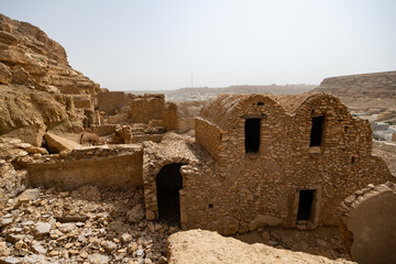 Bright sunny day in hoary ruins Berber village of of Ghomrassen, Tatahouine. View of houses and...