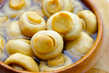 Champignon mushrooms in brine. Canned champignon mushrooms whole