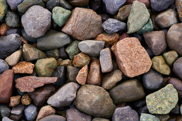Background of stones of different materials and colors