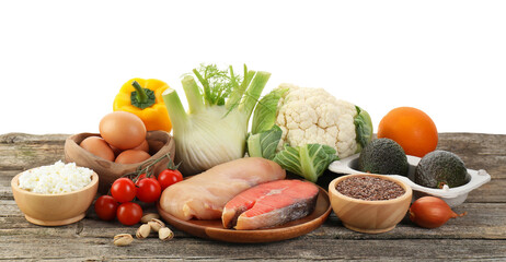 Healthy food. Different fresh products on wooden table against white background