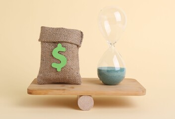 Equality concept. Burlap sack of money, hourglass with sand and seesaw scale on beige background