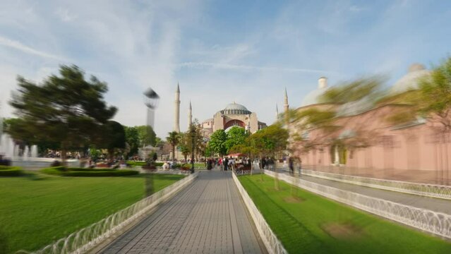 Dynamic hyperlapse view of Hagia Sophia in Istanbul with blurred moving visitors