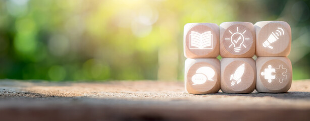 Storytelling concept, Wooden block on desk with storytelling icon on virtual screen.