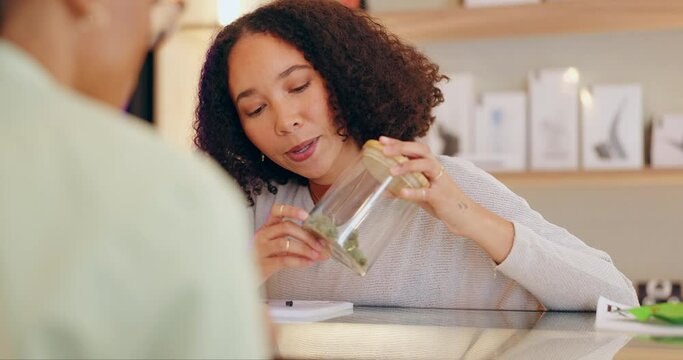 Medical cannabis, woman and sale of marijuana in store for medicine, healing and wellness. Female person, consultation and purchase of weed with advice, instruction and information on thc products