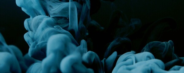 Fototapeta premium Black Background With Blue Smoke
