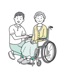 車椅子の高齢女性と介助をする男性介護士のイラスト