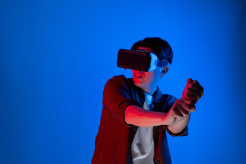 Smart gaming player wearing VR glasses playing golf distance course hologram isolated neon light blue screen connecting digital futuristic technology virtual reality in metaverse world. Contrivance.