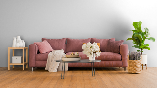 a living room with a pink couch and a plant - Powered by Adobe