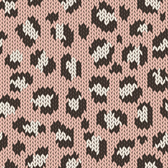 Knitted animal skin seamless pattern. Fabric imitation vector background. Flat style knit wallpaper with leopard print. Cute design for gift wrap, paper, textile