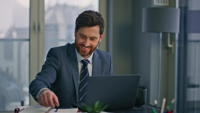 Creative startuper working laptop luxury workplace closeup. Man looking papers