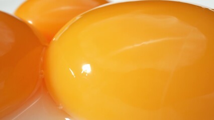 Explore the intricate world of a fresh yolk in stunning macro. Witness the mesmerizing textures and...