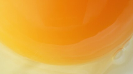 Captured in exquisite macro detail, the yolk transforms into a vivid abstract masterpiece, blending...