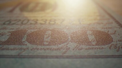 Extreme close-up captures the essence of a one hundred dollars bill. Intricate design in glorious...