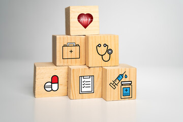Wood cube block with Medical treatment and care. Medical and healthcare icons print.