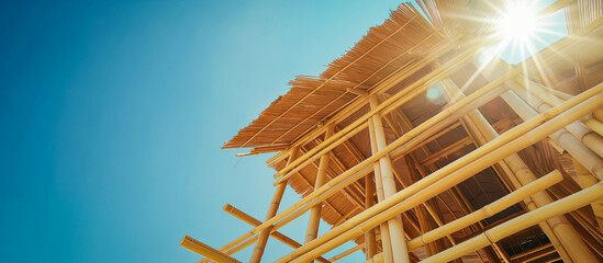 design bamboo construction framework house concept with blue sky background